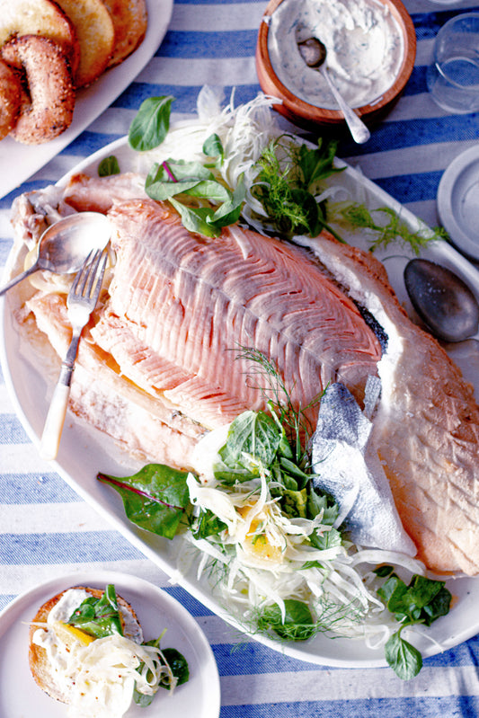 Whole Salt-Baked Akaroa Salmon Served with Bagel Crisps, Lemon Creme Fraiche and Citrus Salad