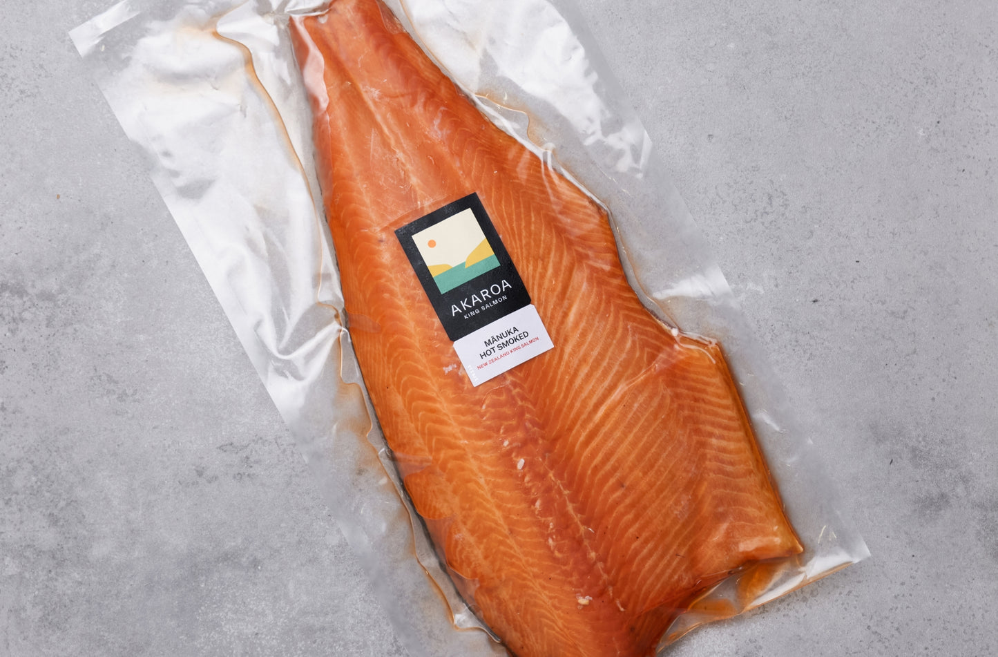 Hot Smoked salmon fillet vacuum packaged with label showing